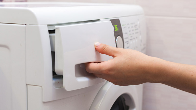 wasmiddelbakje schoonmaken